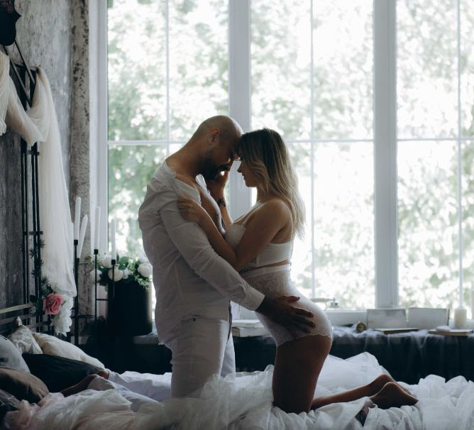 couple hugging in bed couple hugging in bed