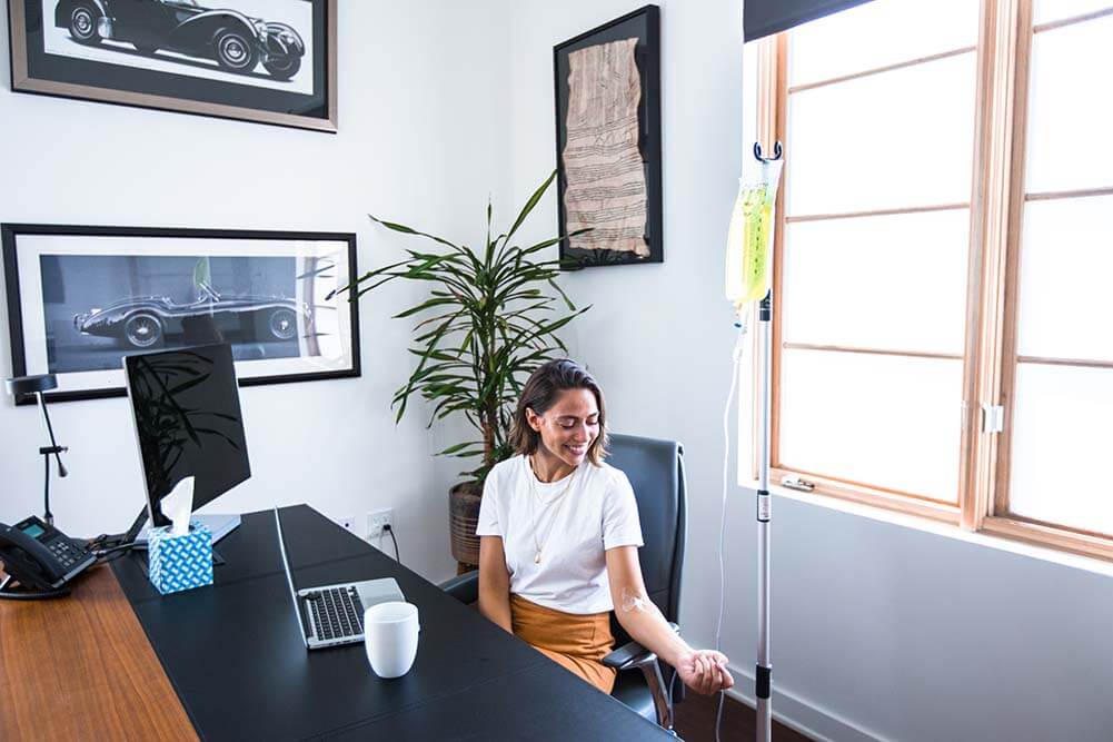 iron_iv woman getting iv at work